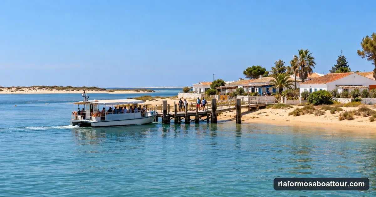A small island ferry at a wooden jetty in a sandy island village in the Ria Formosa